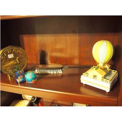 Dollar Coin Bank, Globe Paperweights, Hot Air Balloon Music Box, Brush