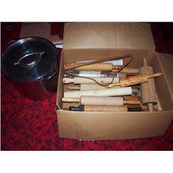Box Full Of Wooden Rolling Pins And A Large Metal Pot