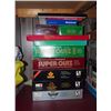 Image 1 : Two Piles Of Board Games, Trivia