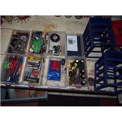 Two Blue Storage Bins With Contents