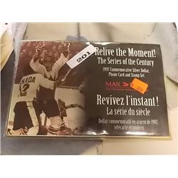 COMMEMORATIVE SILVER DOLLAR, PHONE CARD AND STAMP