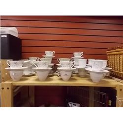 TEA CUPS AND SAUCERS