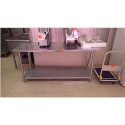 APPROX 5 FOOT LONG STAINLESS STEEL TALBLE WITH LOWER SHELF