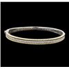 Image 1 : 0.72 ctw Diamond Bangle Bracelet - 14KT White and Yellow Gold