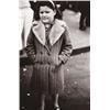 Image 1 : DIANE ARBUS (American, 1923-1971) GIRL IN STORM COAT, N.Y.C. Estate of Diane Arbus copyright stam...