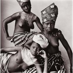 IRVING PENN (American, b. 1917) THREE DAHOMEY GIRLS, ONE RECLINING editioned “26/35” in pencil on...