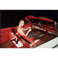 NAN GOLDIN (American, b. 1953) BRUCE IN HIS CAR, NYC, 1981 titled, dated, signed and editioned “B...