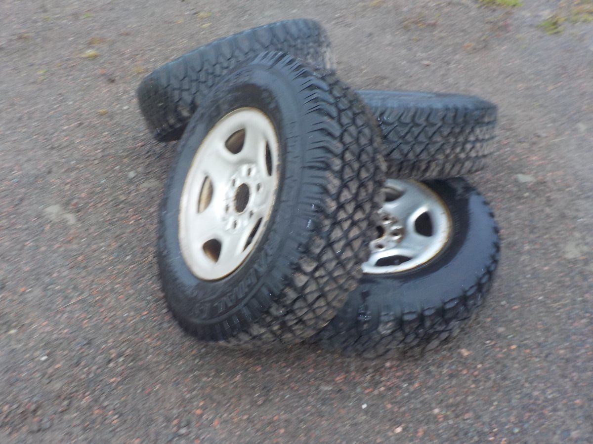 4 ELT TRAILMASTER TIRES ON RIMS 6BOLT, LT225/75R16, M&S STUDDED