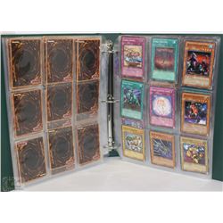 ALBUM OF 180 VINTAGE YU-GI-OH TRADING CARDS
