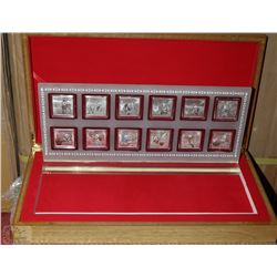 SET OF 12 ELECTROPLATED RABBIT COINS