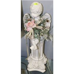 LARGE CERAMIC ANGEL SITTING ON LION HEAD PEDESTAL