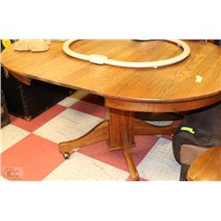 42" ROUND OAK TBALE ANTIQUE WITH TWO -10" LEAFS