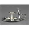 Image 1 : A good George III chamber candlestick, the circular crested tray and cylindrical sconce with spir...