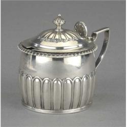 A large George III mustard, the slightly bevelled half lobed body engraved with crest, gadrooned...