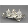 Image 1 : A Victorian inkstand, in 'Jacobethan' style, of shaped outline with paper scroll mouldings, the s...