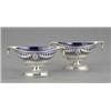 Image 1 : A good pair of Victorian navette shaped pierced pedestal salt cellars, in George III neo-classica...