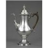 Image 1 : A George III gadrooned baluster coffee pot, the domed lid with bud finial, scroll and bead-cast s...