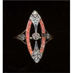 A ruby and diamond ring, c.1915, marquise setting with central collet set old cut diamond with fo...