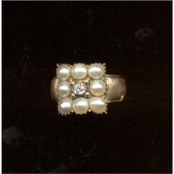 A pearl and diamond ring, c.1850, the square ring head with central old cut diamond surrounded by...