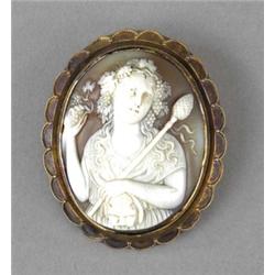 An oval shell cameo brooch, c.1880, the decorative bevelled border with rope garlands, 5.5cm...