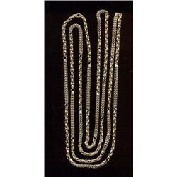 A long chain, the tubular links interspersed with stylised anchors    £300/500...