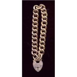 A hollow link bracelet, c.1890, of alternate plain and chased design   £150/250...