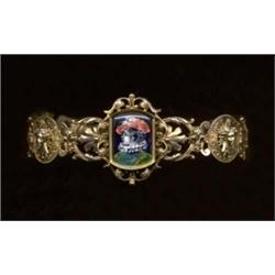 A silver gilt and Limoges enamel bracelet, French, c.1880, the central rectangular enamel depicti...