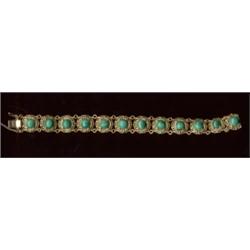 A malachite bracelet, c.1970, each circular motif with a central claw set cabochon malachite and...