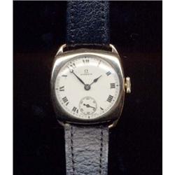 A 9ct gold gentleman's wristwatch, the silvered dial with Roman numerals and quartered hours, sub...