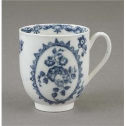 A Caughley coffee cup, painted with 'rose and sprays' in a chevron bordered oval reserve and with...