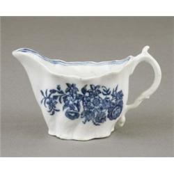 A Caughley 'Low Chelsea' spirally moulded cream ewer, painted with flower sprays and butterflies,...