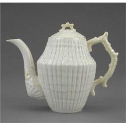 A Belleek coffee pot and cover, with pale yellow handle and knop, 7in high, printed mark, post 19...