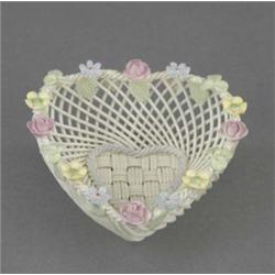 A Belleek heart shaped basket, the rope border with coloured flowers, 6in wide, unmarked   £100/1...