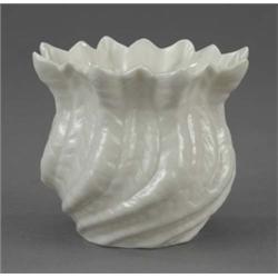 A Belleek spirally moulded flowerpot, with 'crinkle' border, 3.5in high, black mark, 1890-1926...