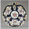 Image 1 : A Worcester blue scale deep plate, the 'mirror' reserves painted with flower sprays within gilt s...