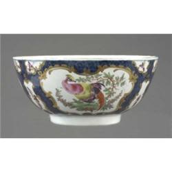 A Worcester blue scale bowl, the 'mirror' reserves painted with exotic birds, butterflies and oth...