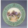 Image 1 : A Royal Worcester plate, with apple green and gilt floral scroll border, painted with a named vie...