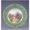 Image 1 : A Royal Worcester plate, with apple green and gilt floral scroll border, painted with a named vie...