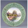 Image 1 : A Royal Worcester plate, with apple green and gilt floral scroll border, painted with a named vie...