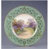 Image 1 : A Royal Worcester plate, with apple green and gilt floral scroll border, painted with a named vie...