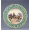 Image 1 : A Royal Worcester plate, with apple green and gilt floral scroll border, painted with a named vie...