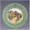 Image 1 : A Royal Worcester plate, with apple green and gilt floral scroll border, painted with a named vie...