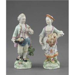 A pair of Derby figures of Spring and Summer, he wears a pale green jacket and lemon breeches and...
