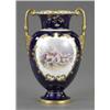 A Royal Crown Derby baluster vase, painted with flowers, by John Porter Wale, signed, reserved in...