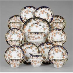 A Royal Crown Derby tea service, pattern 9259, painted and gilt with flowers in the Kakiemon pale...