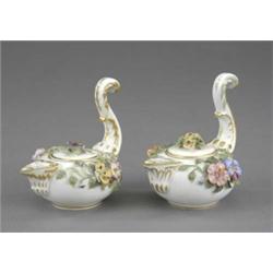 A pair of Sampson Hancock Derby 'Roman lamps' and covers, with tall gilt scroll handle and encrus...