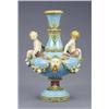 A Minton majolica vase, mounted with putti, fruit, garlands and masks, the narrow neck and stem m...