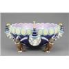A rare Wedgwood majolica 'Punch and Toby' punch bowl, the four handles modelled as the head of Mr...
