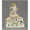 Image 1 : A Staffordshire tree stump vase group of a black spotted hound pursuing a stag, shredded clay enc...