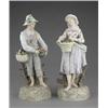 Image 1 : A pair of French coloured biscuit figures of fruit vendors, in flowered 18th century costumes, on...